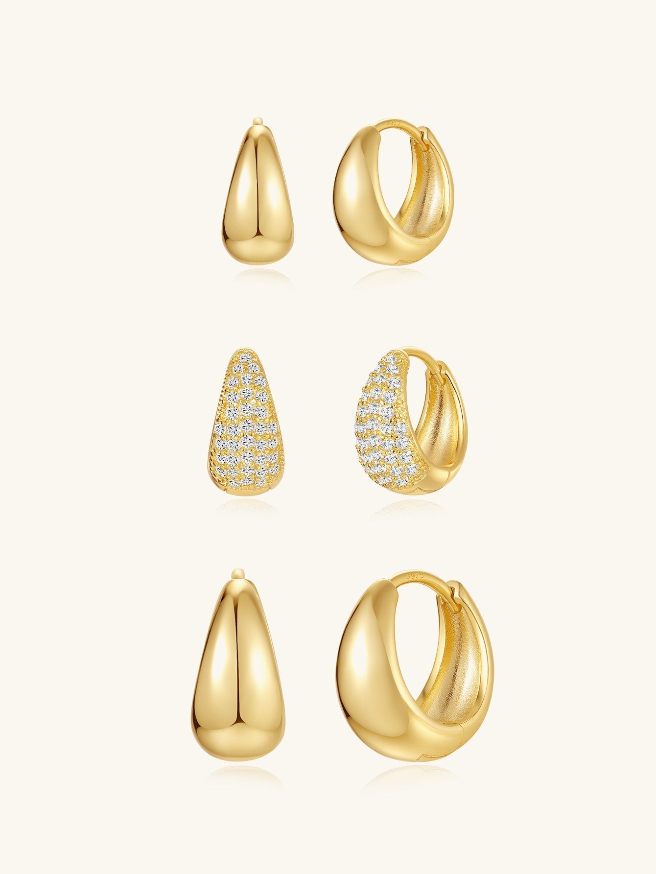 ロザリー – 曲線構造の柔らかいゴールドのイヤリング。