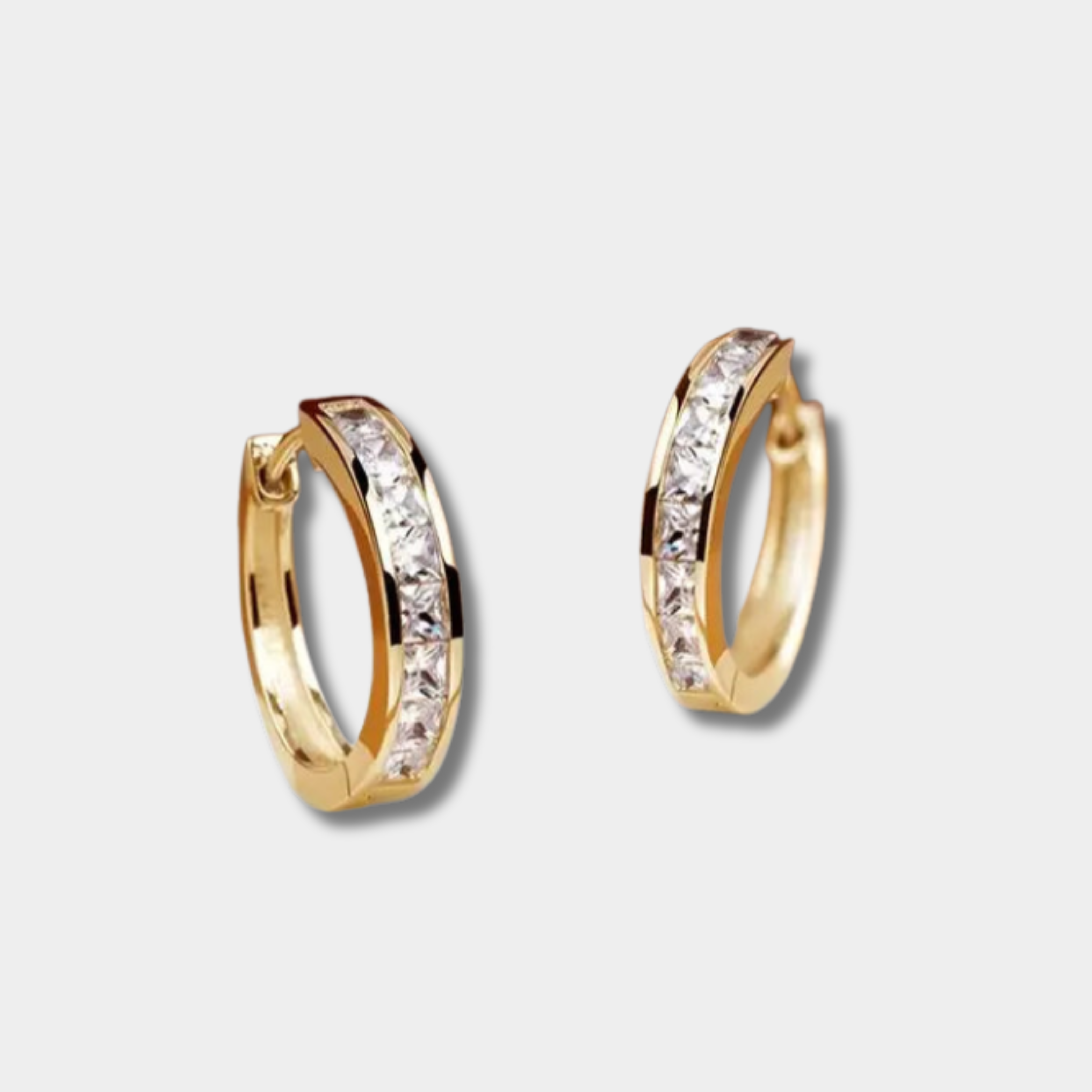 パヴリーナ - クリスタル付きエレガントなゴールドイヤリング